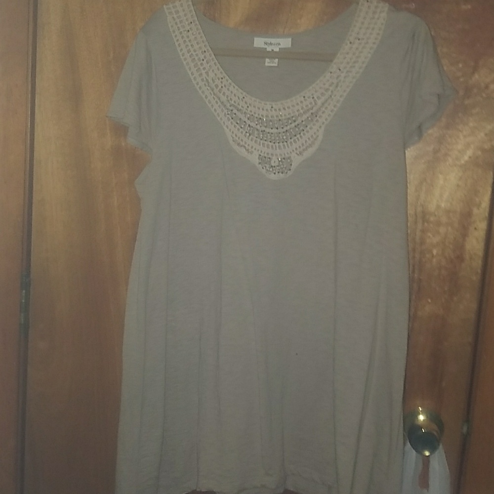 Tan short sleeve shirt with beading
